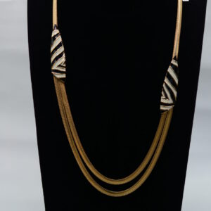 Givenchy's vintage jewellery pieces from the 70s, 80s, and 90s are now highly collectible. Their timeless chic and quality craftsmanship make them enduring favourites. When collecting vintage Givenchy, here are some tips to ensure authenticity and quality: Signature Logo: Look for the designer stamp. Pieces from 1975-1980 will be dated, while 80s and 90s pieces will often feature "Givenchy," "GIVENCHY Paris," or "Givenchy Paris New York." Quality Materials: Vintage Givenchy jewellery is known for its high-quality plating and materials, which age well and resist tarnishing. Clasps and Fastenings: Authentic pieces have well-constructed clasps and fastenings, often featuring the Givenchy logo or name. Condition: Genuine vintage pieces should show signs of wear consistent with their age but should be in good overall condition with minimal damage. Provenance: When possible, research the provenance of a piece, including previous owners and original purchase details.